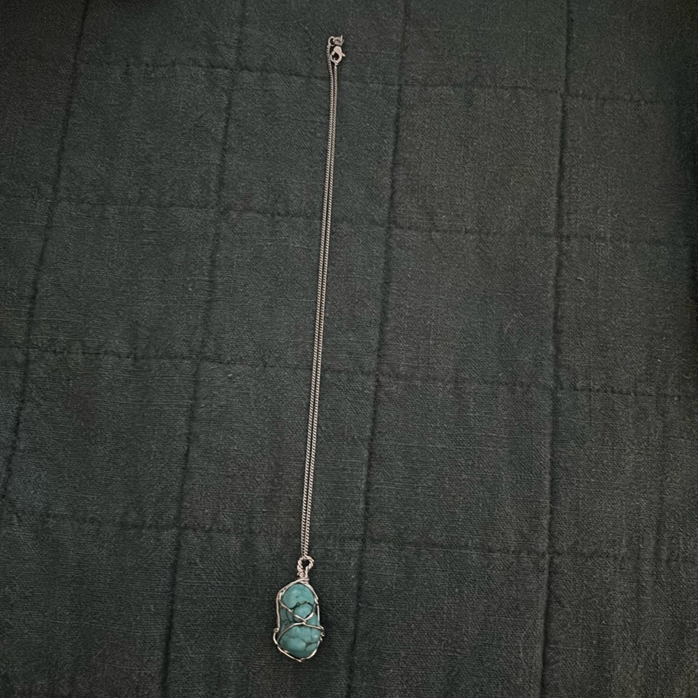 Turquoise wire wrapped necklace in sterling silver.